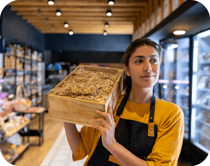 A woman working in a grocery store
